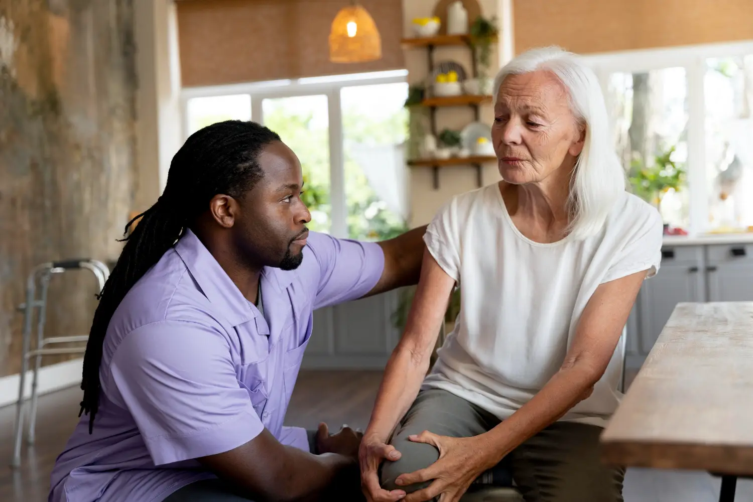 Calvary-african-social-worker-helping-senior